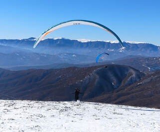 hiking and paragliding